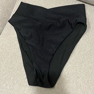 Aerie Crossover black high waisted bikini bottoms.